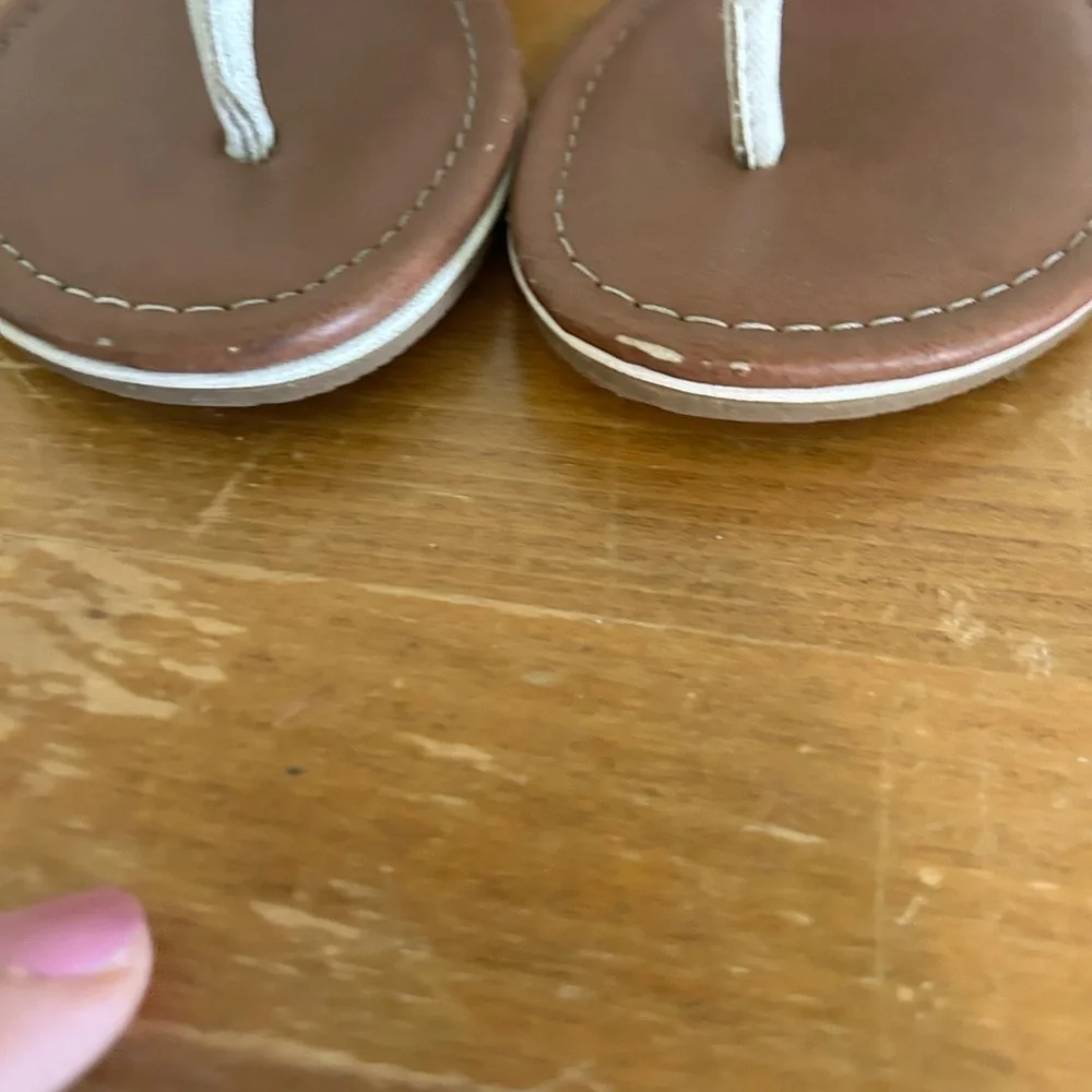 Youth size, one justice, gladiator, white, and silver sandals